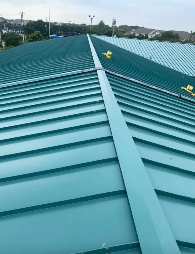 Green commercial metal roof ridge and valley for Metal Roof Repair in Angier